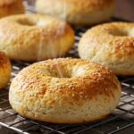 Cottage Cheese Protein Bagels: The Ultimate High-Protein Breakfast Choice 9 Freshly baked cottage cheese protein bagels cooling on a rack